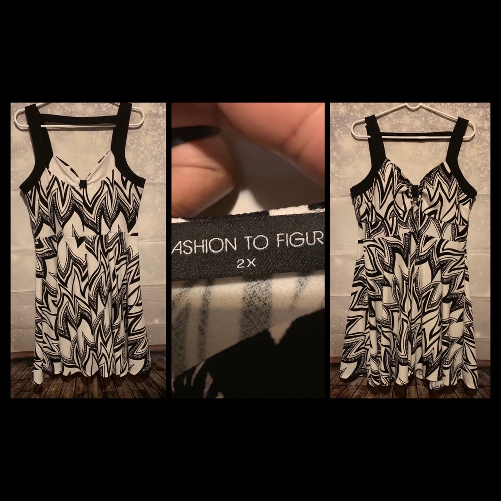 Black and white sleeveless dress.